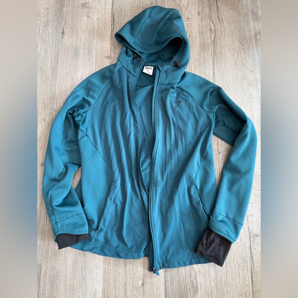 Gymshark Men's Medium Hooded Performance Jacket with Pockets and Thumb Holes